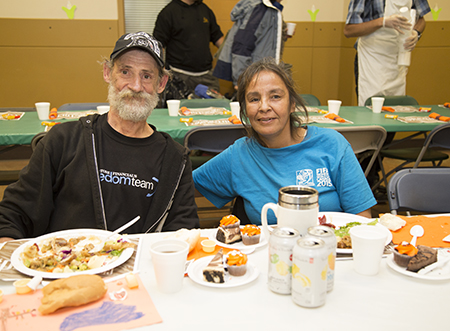 Guests enjoy a meal at Hope Mission